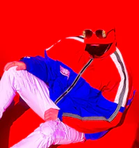 Creative fashion-inspired portrait of Nevv Evve posing against a vivid red background showcasing immersive alternative pop artist branding.